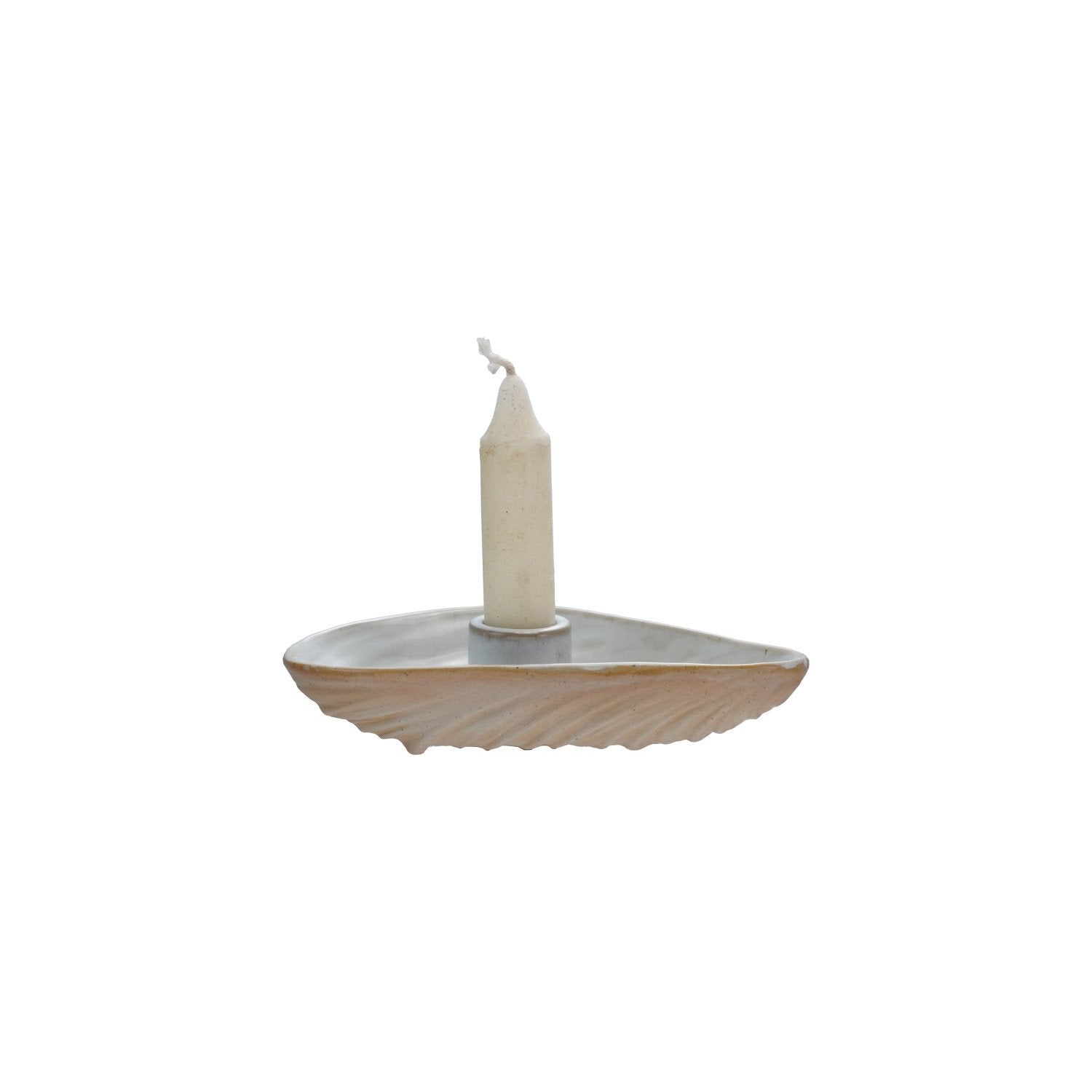 Ceramic candle holder with a white candle on a white background