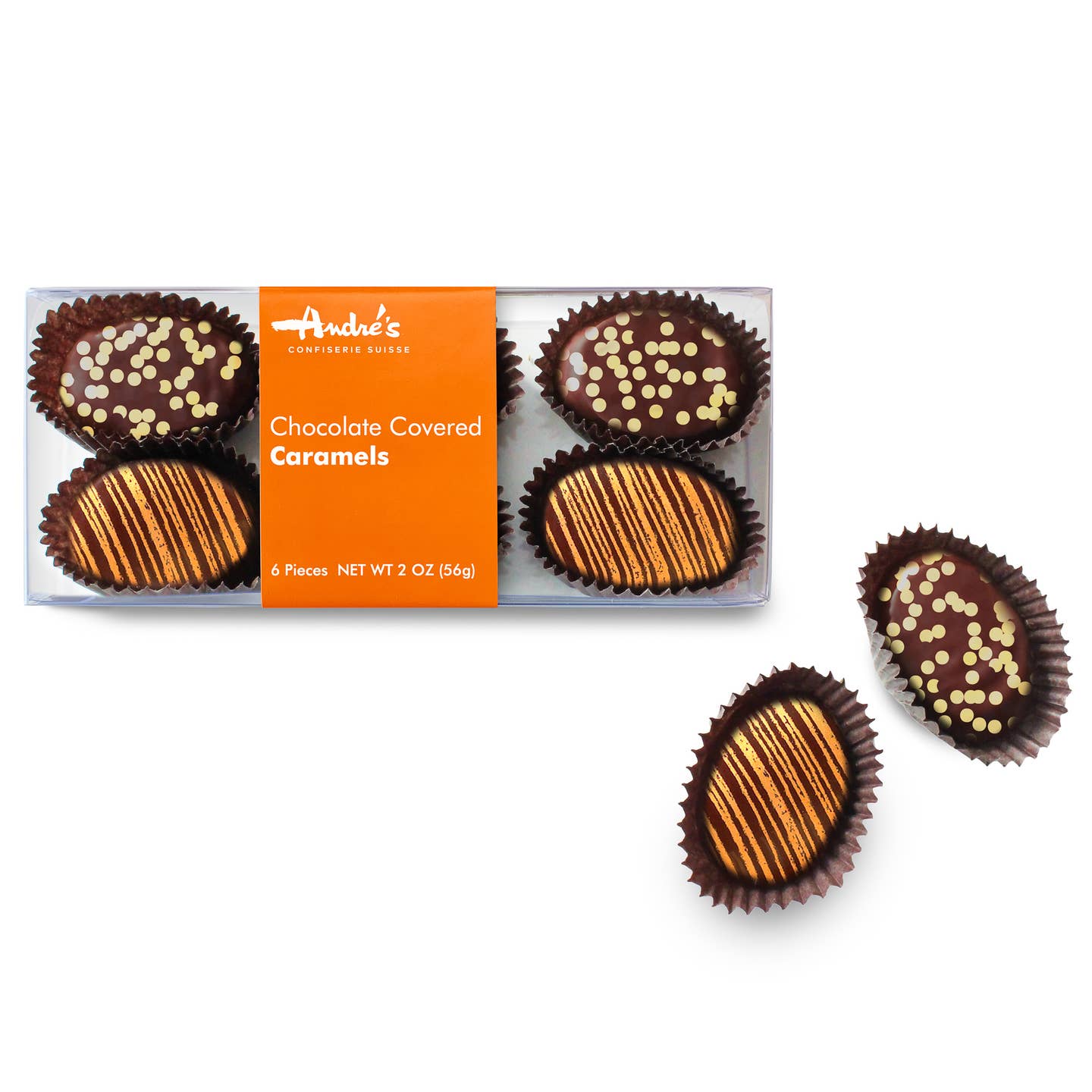 Oval chocolate candies with fall color designs in a clear box with an orange product label. Two candies are beside the box.
