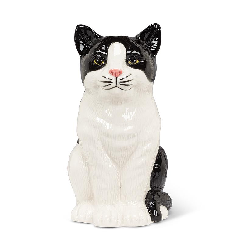 Cat-shaped ceramic jar with black and white pattern on a white background