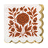 Paper napkin illustrated with an orange floral design and gold scalloped edging. 
