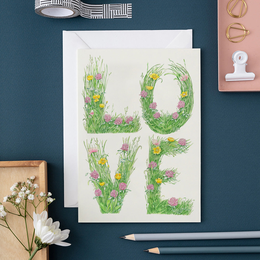 Greeting card with floral design spelling &