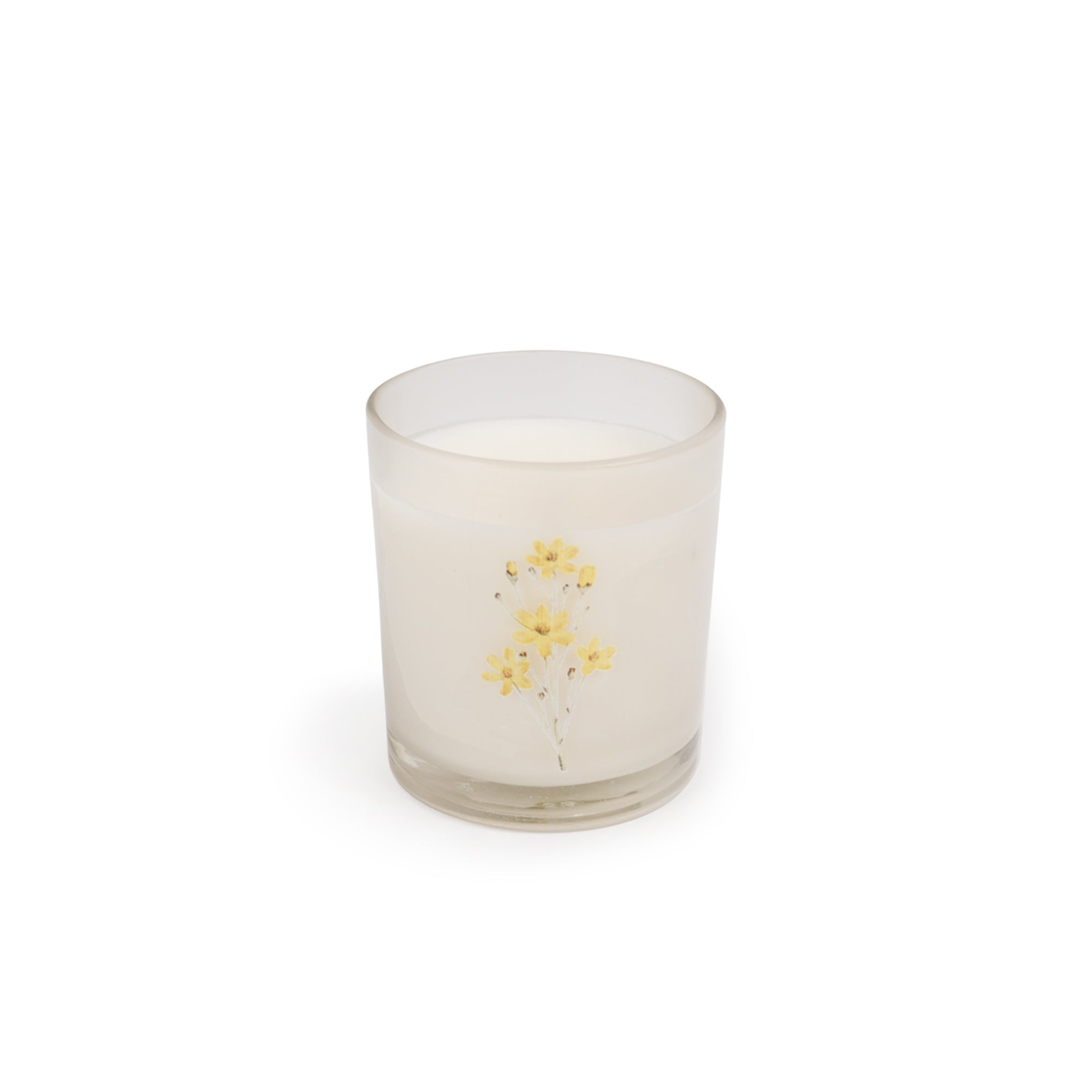 Glass candle with flowers on it. 