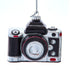 Camera-shaped ornament on a white background