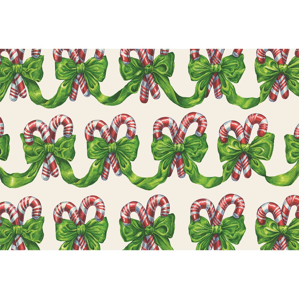 Pattern of candy canes and green bows on a beige background