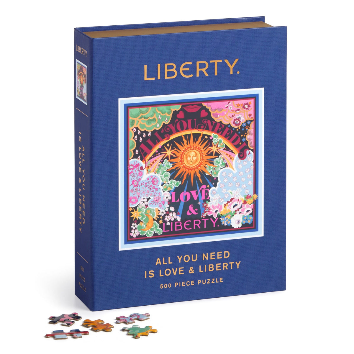 A jigsaw puzzle designed to look like a keepsake box with magnetic closure, titled &quot;Liberty All You Need is Love Puzzle&quot; featuring a colorful, Thorpe print design. It consists of the Liberty All You Need is Love 500 Piece Book Puzzle by Chronicle Books.