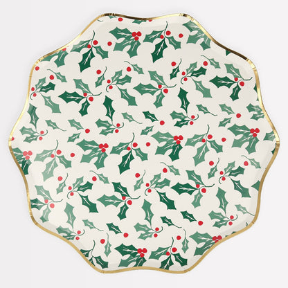 Meri Meri Holly Side paper plates featuring a holly design, wavy border and shiny gold foil details, perfect to add to your Christmas party supplies.
