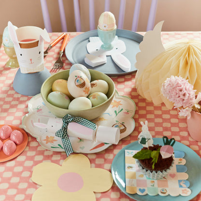 Four Meri Meri Lop Eared Bunny Cups with gingham bows on a white background.