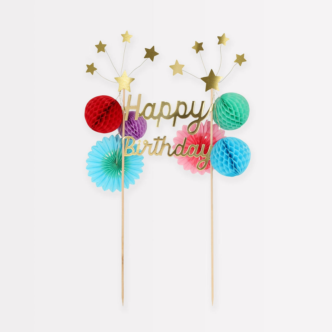 A Happy Birthday Honeycomb Cake Topper with gold foil stars and pom poms by Meri Meri.