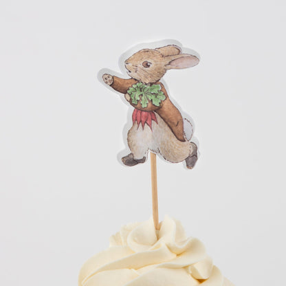A Peter Rabbit™ In The Garden Cupcake Kit with a bunny-shaped cupcake topper by Meri Meri.
