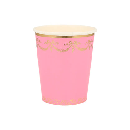 A pink Ladurée Paris cup with gold trim for cups by Meri Meri.