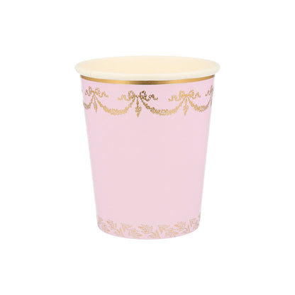 A pink Ladurée Paris cup with gold trim, perfect for Meri Meri collaborations.