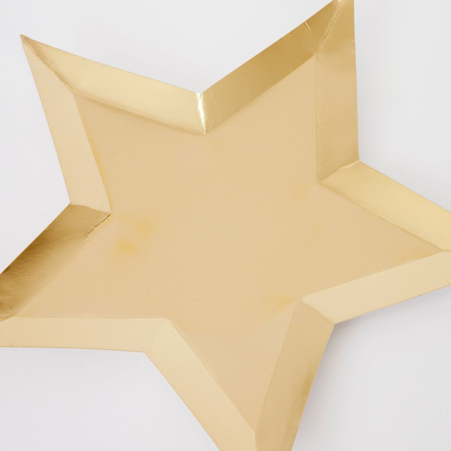 Close up of the gold star shaped plate