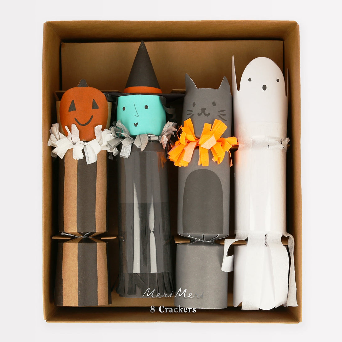 Four styles of Halloween crackers; a pumpkin, a witch, a cat, and a ghost 
