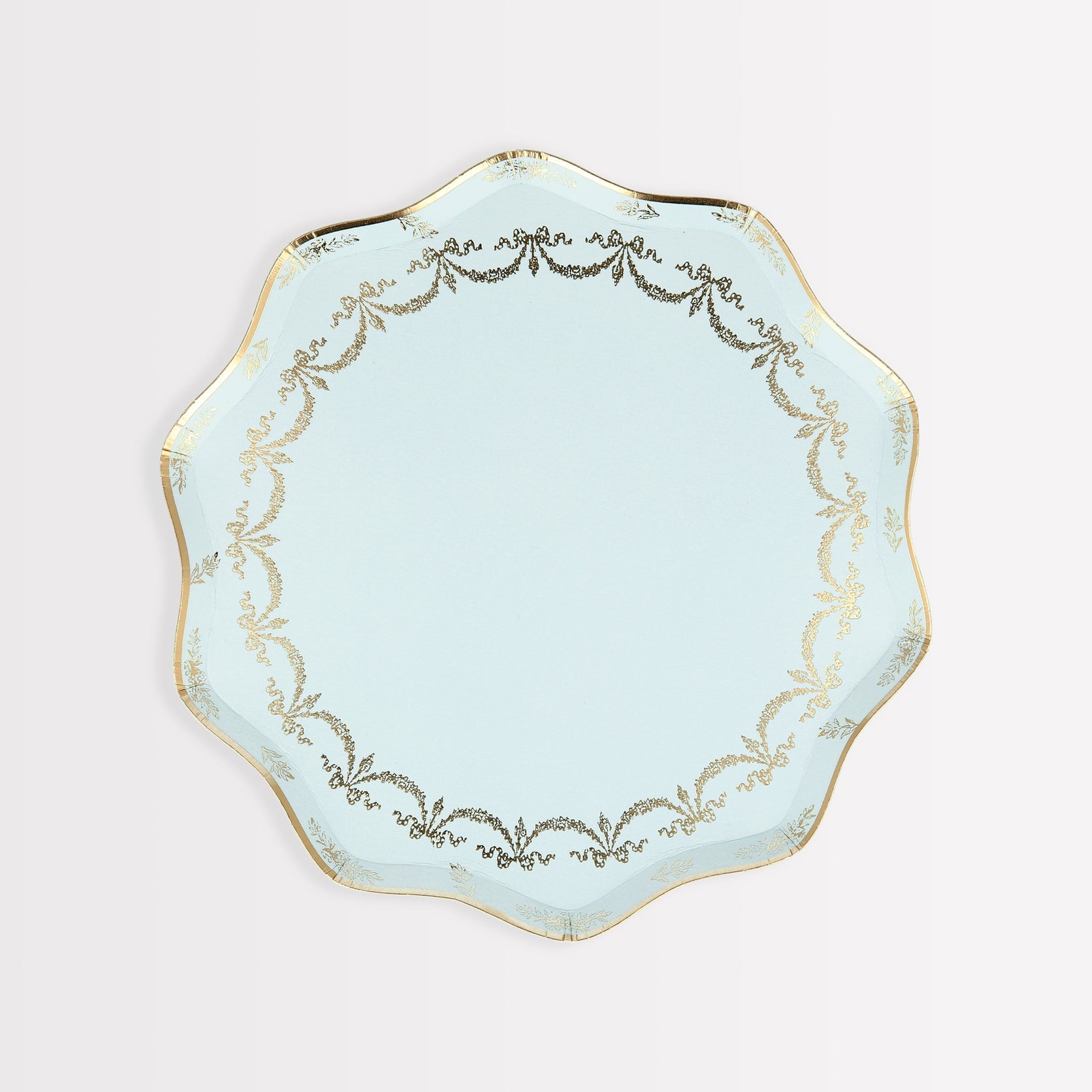 A light blue Ladurée Paris Paper Plate with gold trim perfect for serving desserts at Meri Meri.