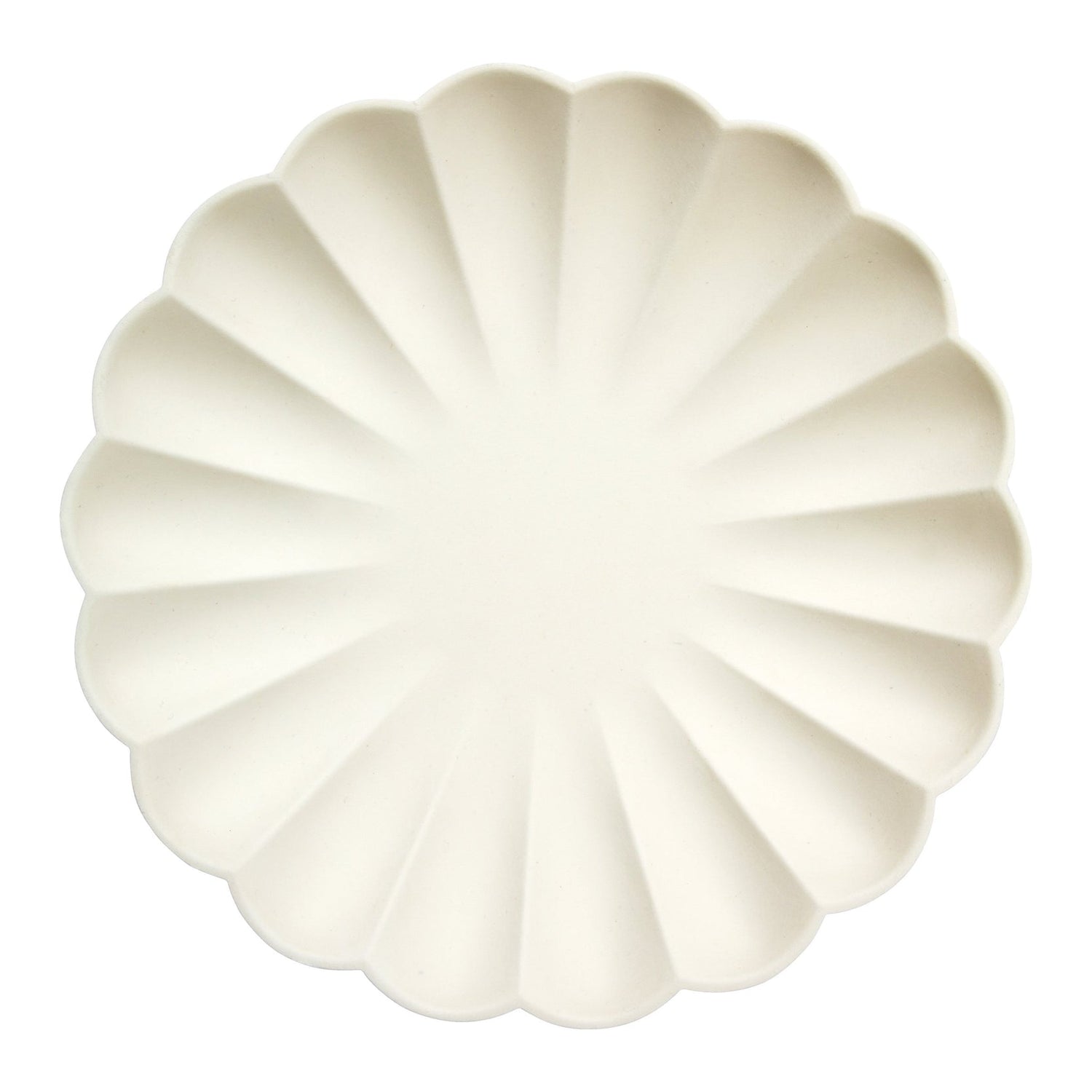A Meri Meri cream eco plate with a flower pattern on it made from natural materials.