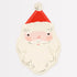 A round paper plate with a illustration of Santa Claus in red and gold colors.