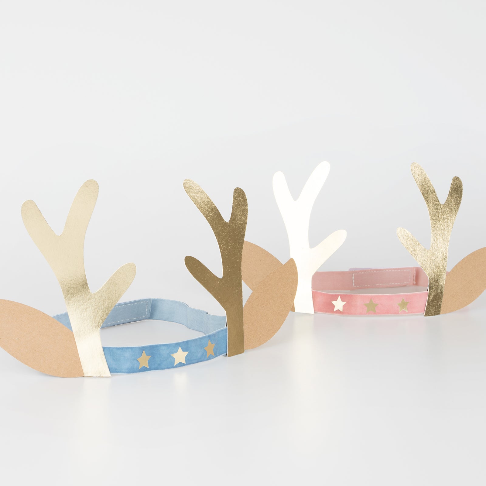 Two reindeer headbands in blue and pink.