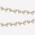 Gold bow garland on a white background.
