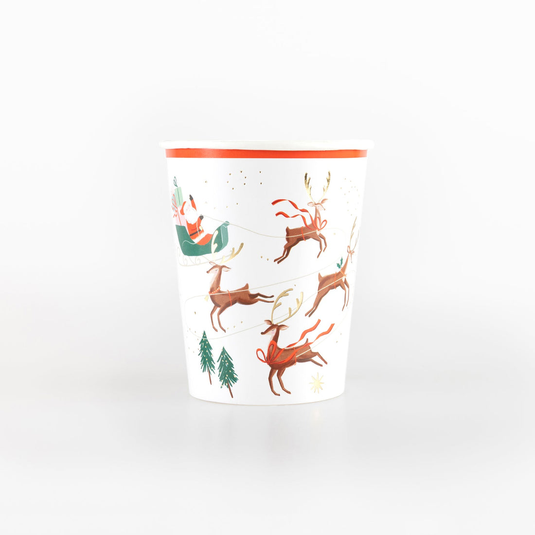 Paper cup by Meri Meri with an illustration of Santa and his reindeer on it. 