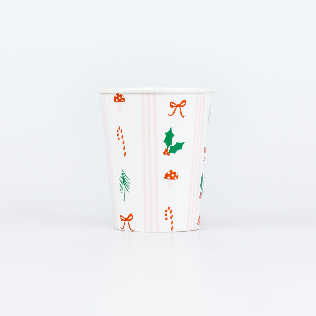 White cup with Christmas-themed illustrations on a white background.