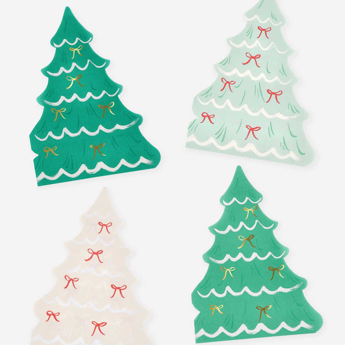 Four Christmas tree-shaped paper napkins by Meri Meri with illustrations of ribbons on them on a white background.