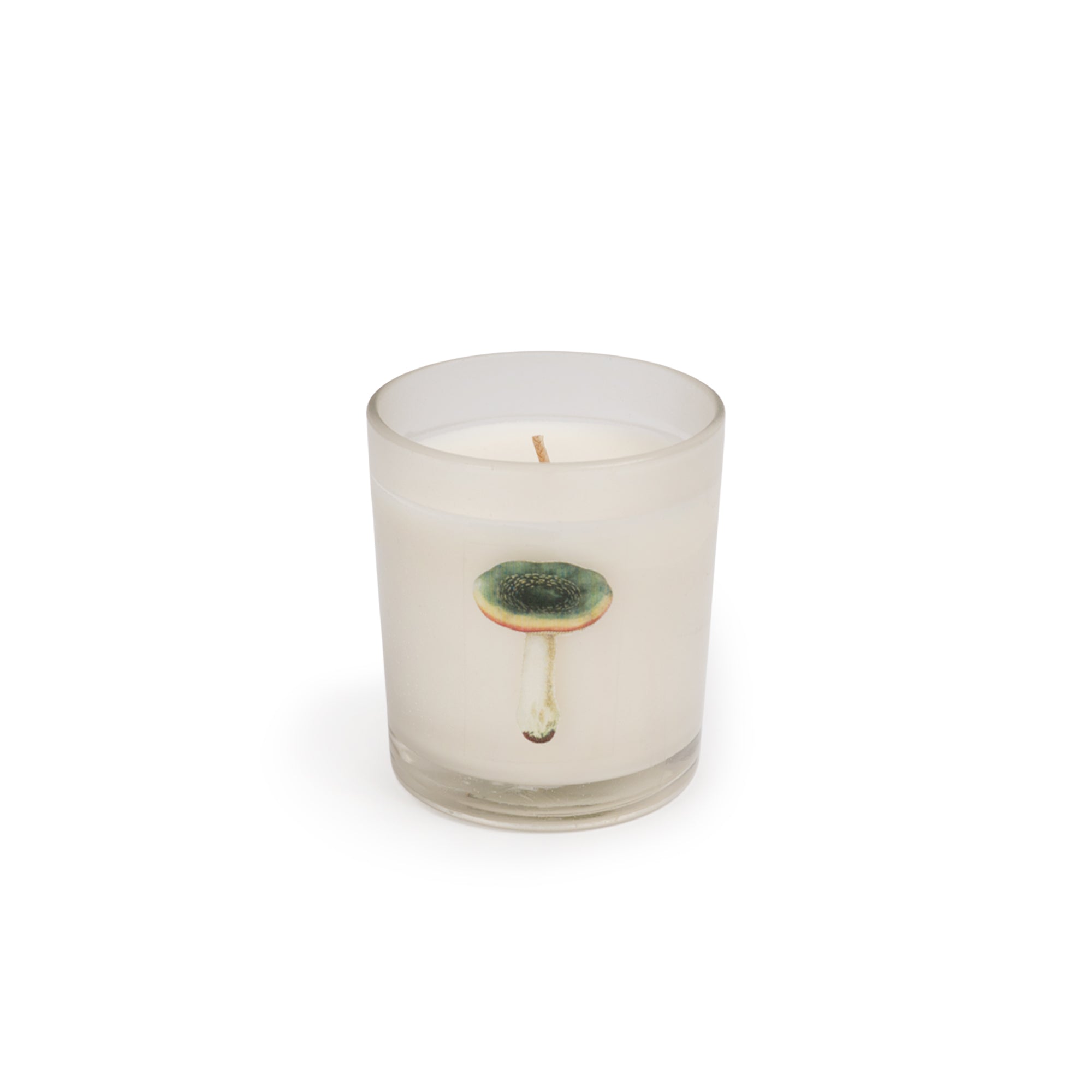 Clear glass candle with decorative element on a white background.