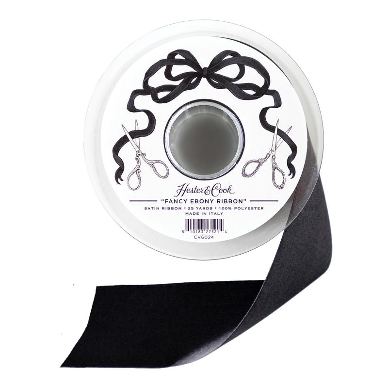 A spool of black satin ribbon from Hester &amp; Cook on a white background.