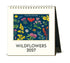 A desk calendar featuring vintage illustrations of wildflowers.