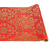 Roll of red runner paper with gold floral pattern