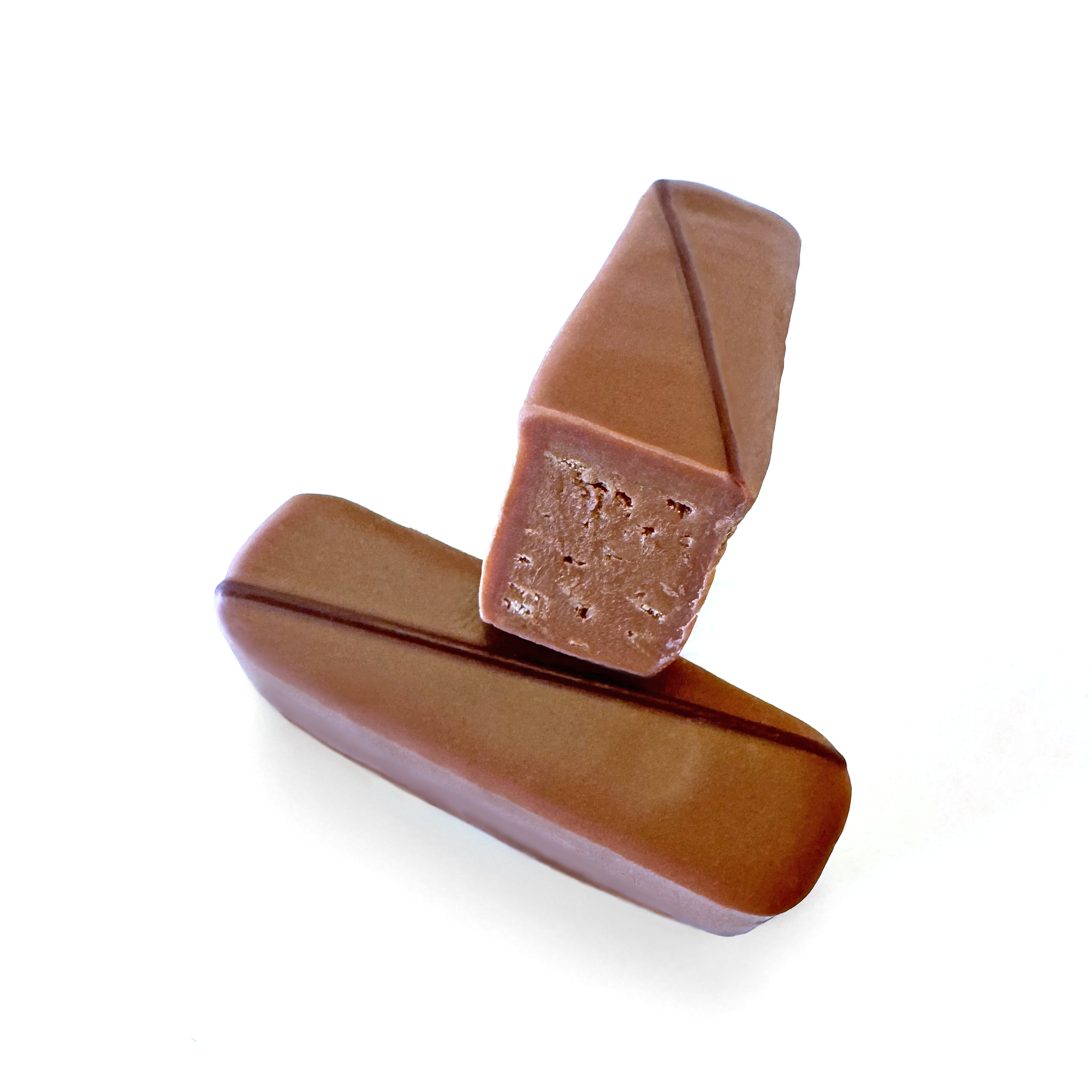 Two pieces of chocolate on a white background.