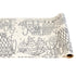 A roll of cream paper with a festive black line art design of a gingerbread winter wonderland scene, perfect for coloring. 