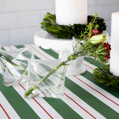 Two Qualia mouth blown clear vases - exclusively at Hester &amp; Cook - with small bouquets on a table.