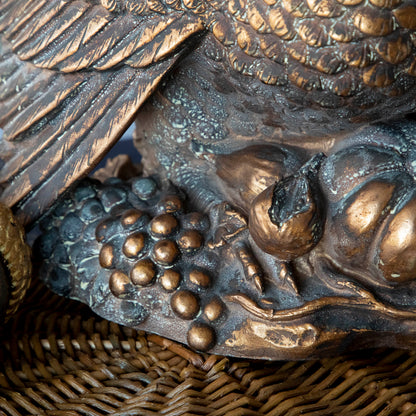 A close up of the Antique Bronzed Turkey base showing its rustic look and vegetables at the base.