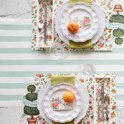 The Sweet Garden Placemat under an elegant springtime table setting for two, from above.
