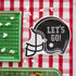 Football helmet paper plates with the words "LET&