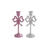 Two bow-shaped candle holders, one pink and one white, on a white background.