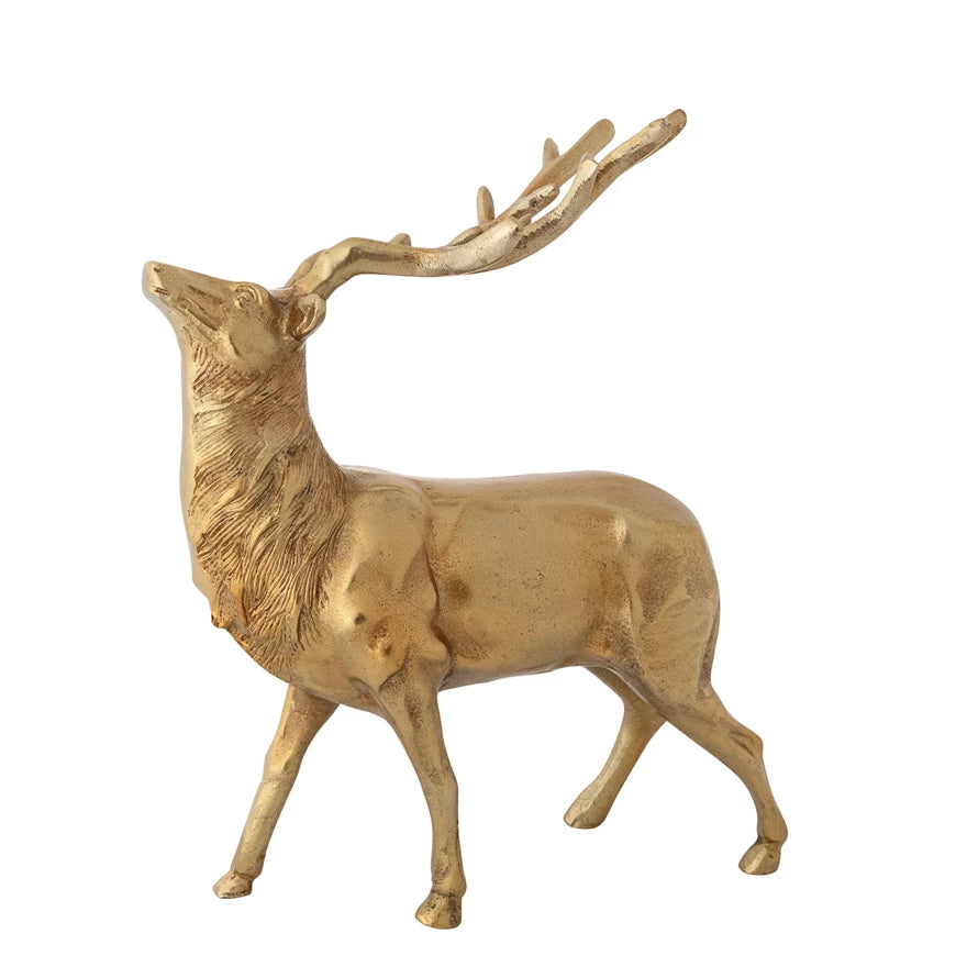 Gold deer figurine on a white background.