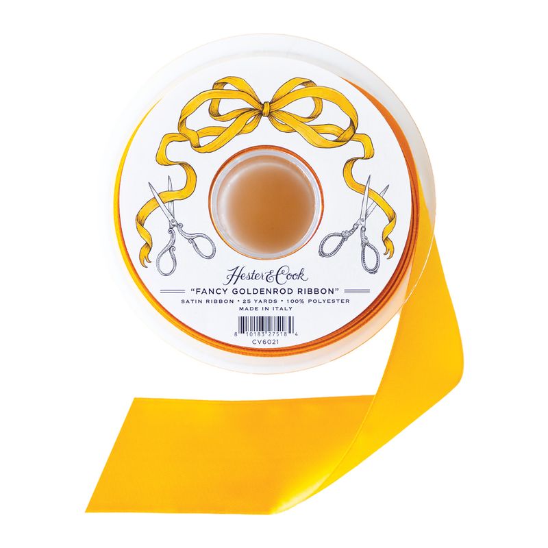 A spool of deep yellow satin ribbon from Hester &amp; Cook on a white background. 