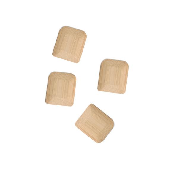 Four pieces of bamboo pot scrapers with a natural food-safe oil finish, isolated on a white background.