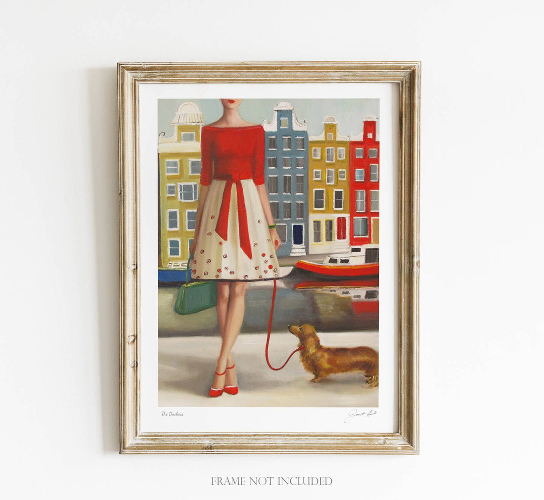 A framed print of The Duchess Small Art Print by Janet Hill, featuring a woman with a dachshund, produced in a painting style by the Canadian fine artist, utilizing archival inks.