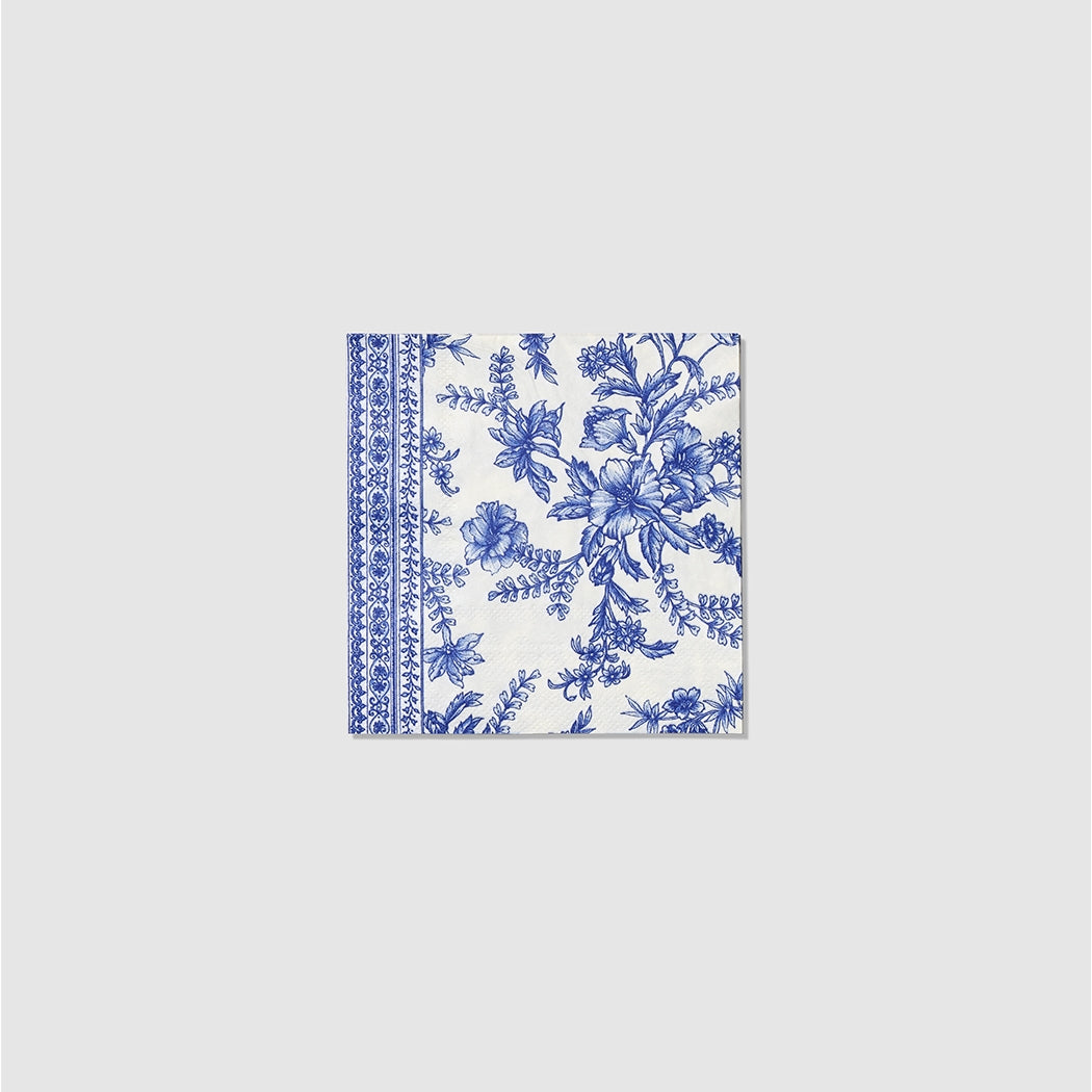 A Blue French Toile Paper Party Dinnerware napkin on a white background by Coterie Party Supplies.