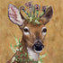 A Woodland Princess-themed painting featuring a deer adorned with flowers on its head, set against a table setting with Paper Products Design Woodland Princess Lunch Napkins.