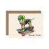 A Hester & Cook Border Terrier greeting card showcasing a dog riding a skateboard, perfect for dog lovers.