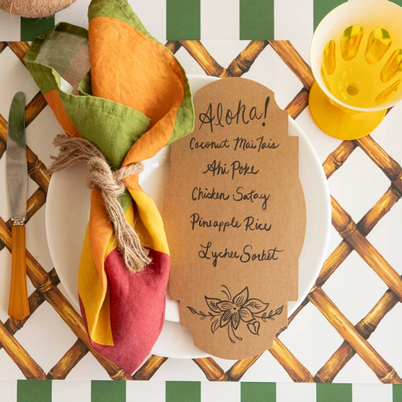 The Bamboo Lattice Placemat under a tropical themed place setting. 