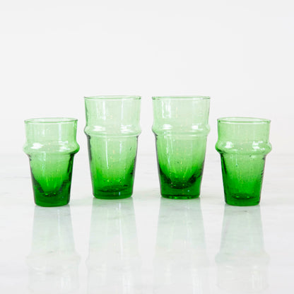 A group of green Kiss That Frog Beldi glasses.