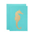 A Blue Seahorse Card with a gold seahorse on it from Hester & Cook.