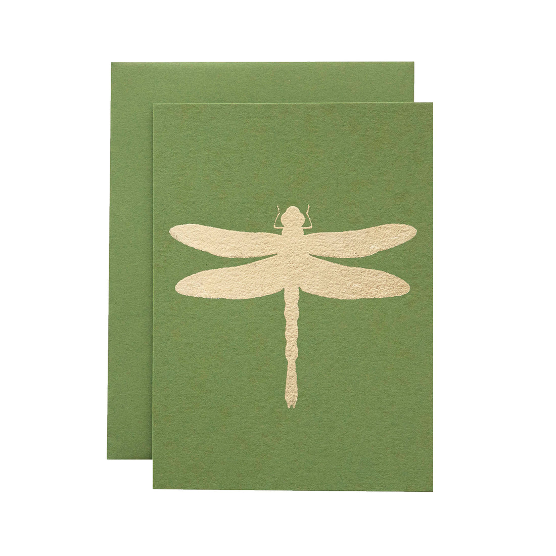 A leaf-green card with the silhouette of a dragonfly in solid gold leaf.