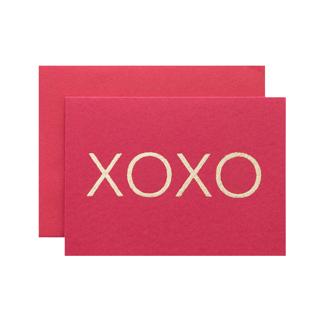 A red card featuring a large &quot;XOXO&quot; in solid gold leaf.