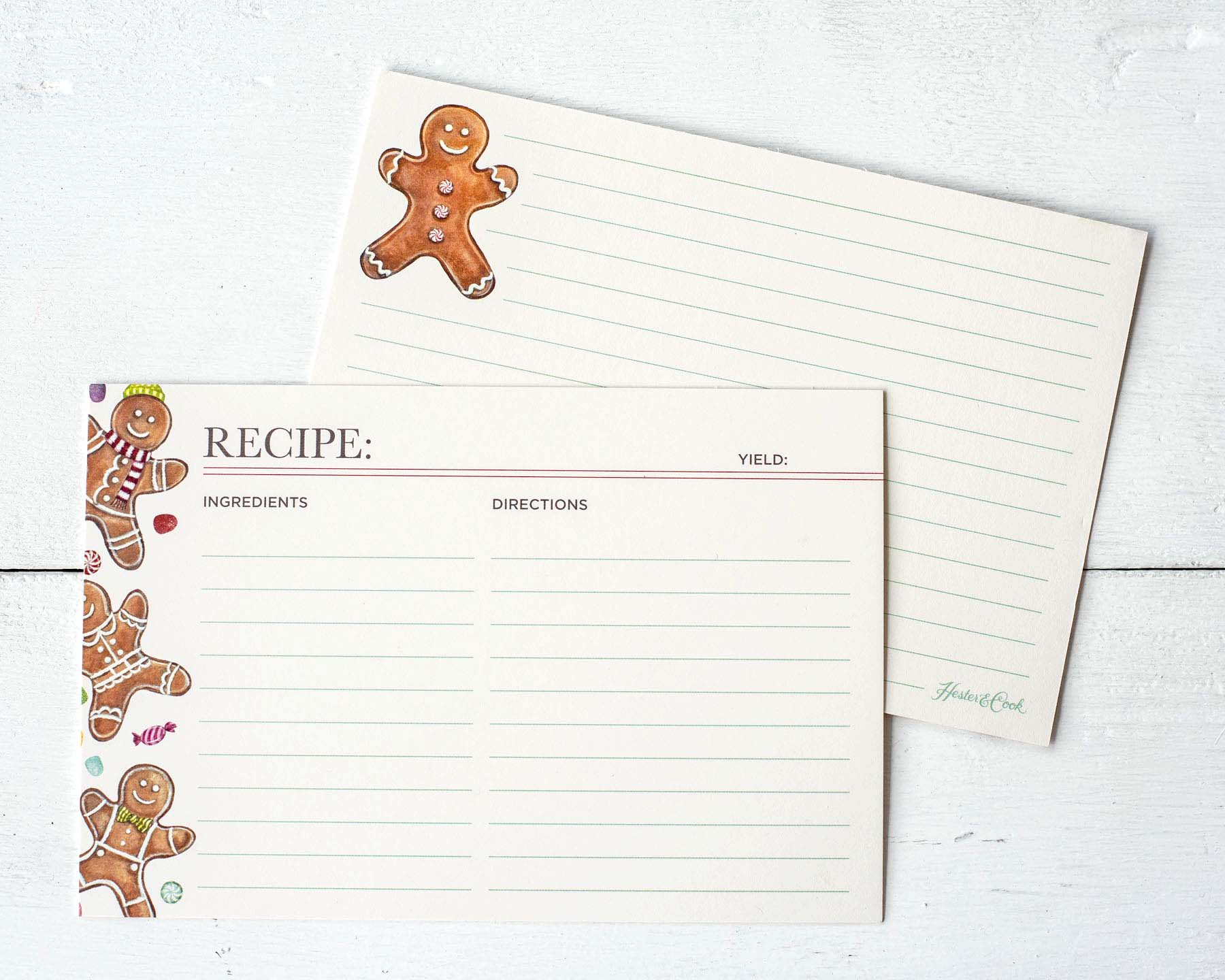 Two Hester &amp; Cook Gingerbread Man Recipe Cards adorned with gingerbread men, perfect for gifting.