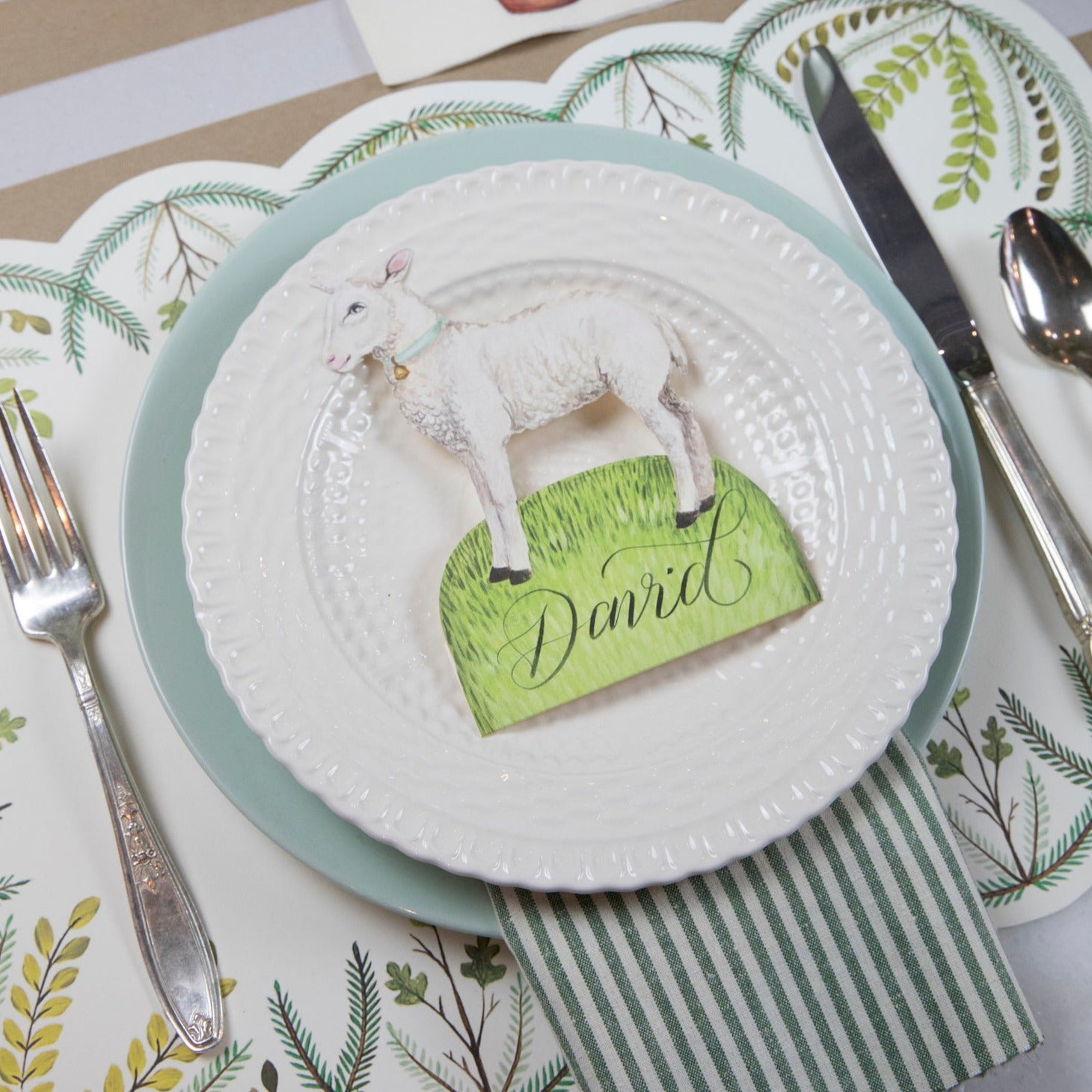A table setting with a Little Lamb place card by Hester &amp; Cook.